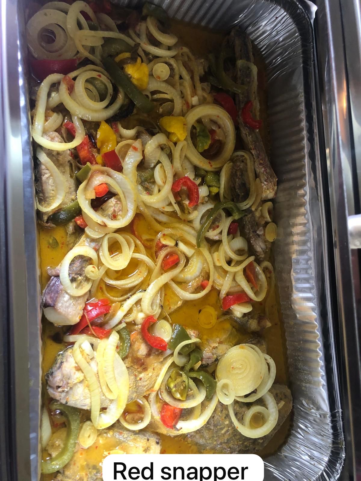 Red Snapper Caribbean Style Caribbean red snapper with onions peppers and seasoning